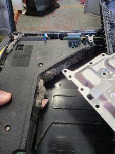 Dust packed around the PS5 power supply housing before cleaning