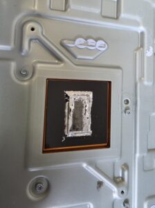 Uneven liquid metal on the PS5 heatsink contact surface before servicing