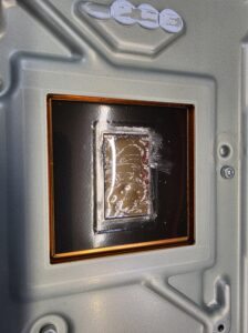 PS5 heatsink contact surface during liquid-metal servicing